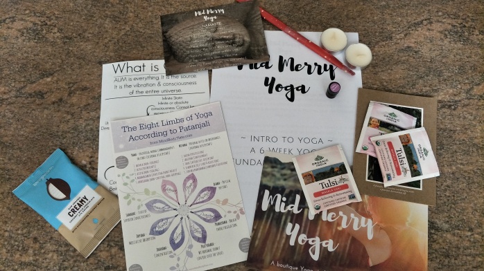 Some of the items I found in my goodie bag - tea, candles, incense, yoga fact book, yoga timetable.